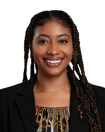 Danielle Clarke smiling in a professional headshot.