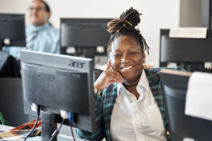 Woman in tech on computer.