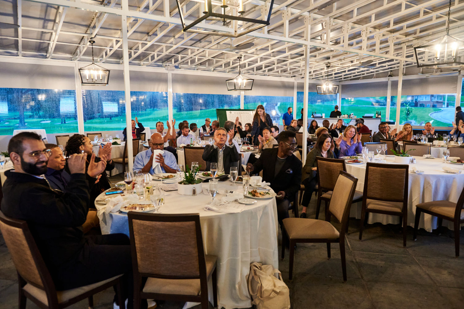 Golf tournament participants at awards dinner.