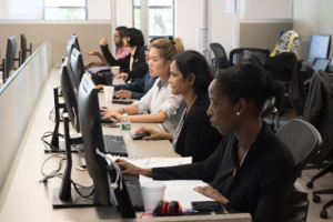 Diverse group of learners at computers