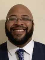 A headshot photo of James Yazbek