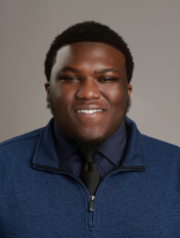 Per Scholas Staff Headshot of Okole Bashonga